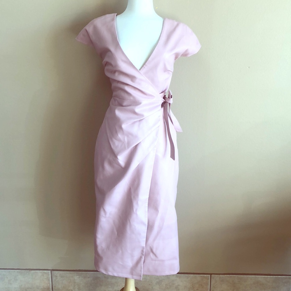 A pink pleather wrap dress from Top Shop